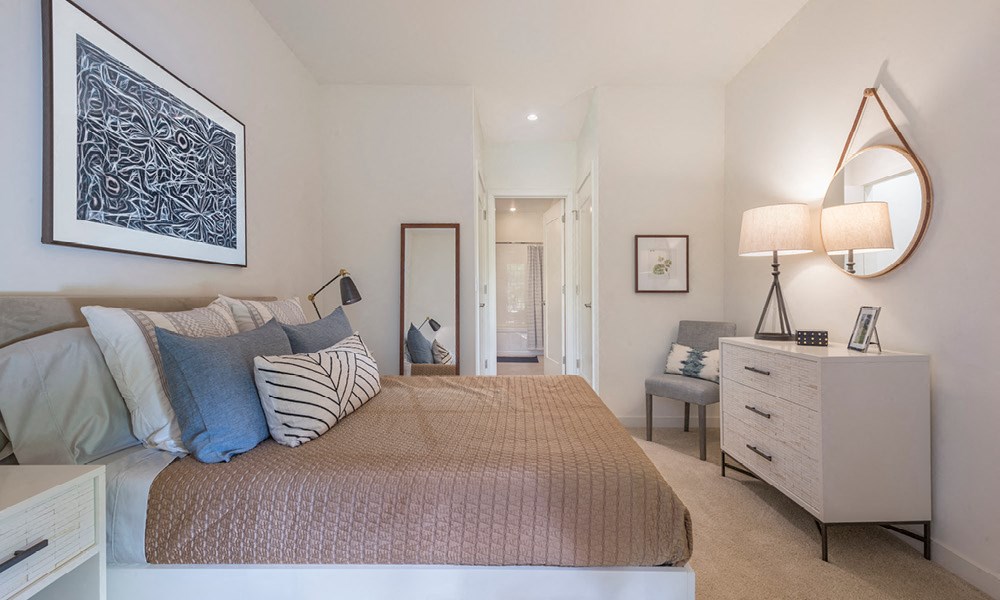 fully furnished apartment bedroom with modern decor