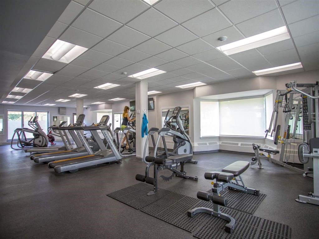 a gym with weights and other exercise equipment