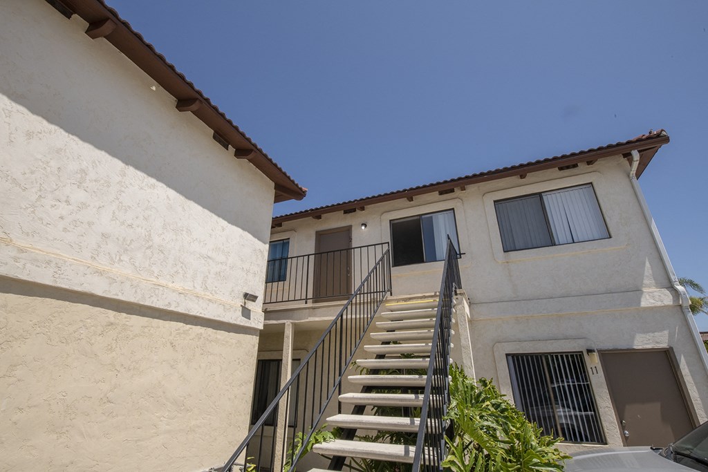 a building with stairs and a window on the side of it at Casa Sol Apartments, California, 91932