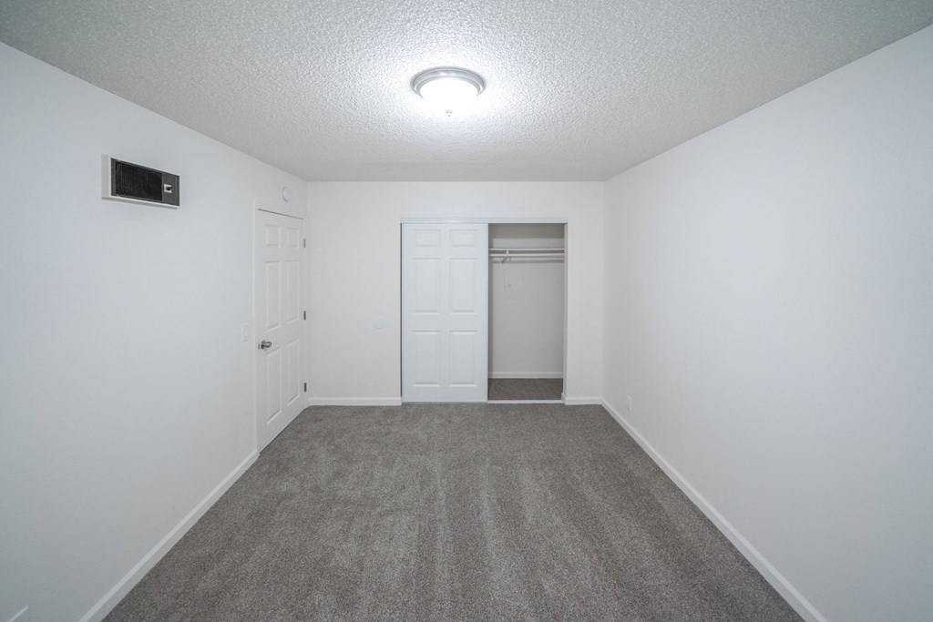 Bedroom with closet at Costa Fina Apartments, Chula Vista, CA, 91911
