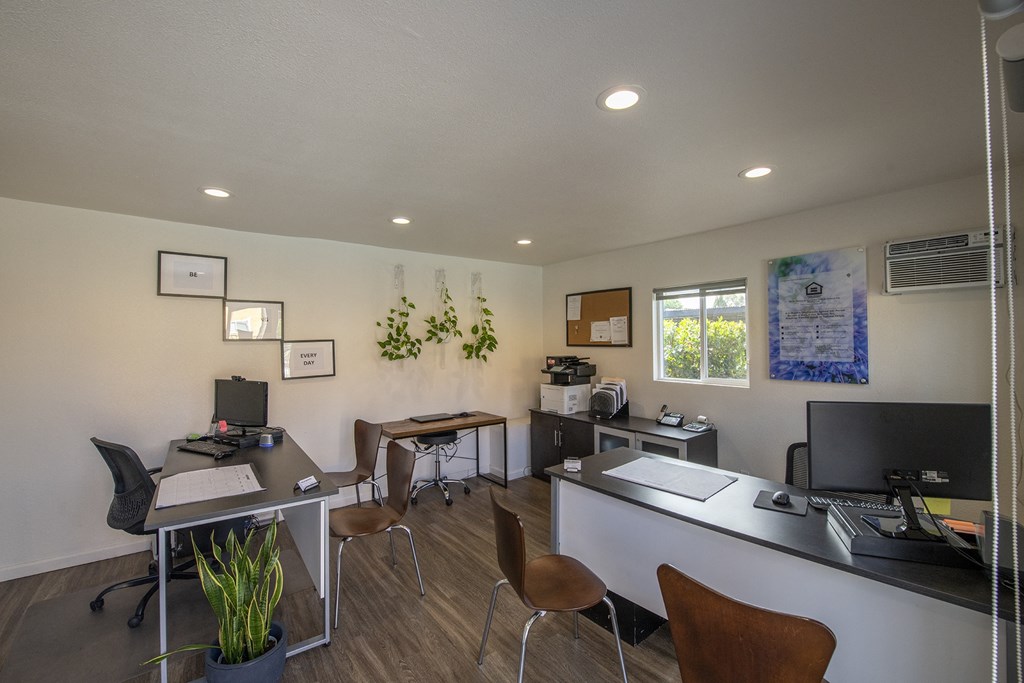 an office with two desks and chairs and a computer at Villa Quixote Apartments, Escondido, 92025