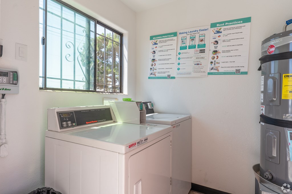 Laundry room with washing machine and dryer.