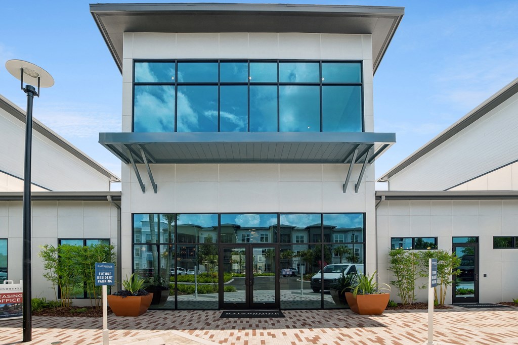 a building with large glass doors and windows