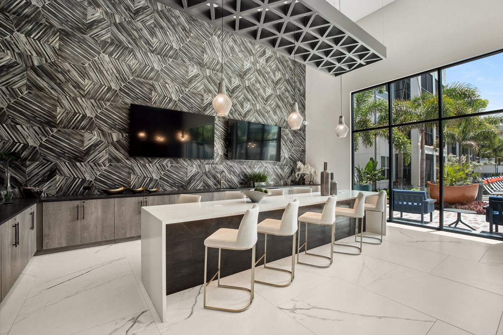 a rendering of a kitchen with a large white island with chairs and a large window