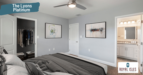 a bedroom with a bed and a closet and a ceiling fan