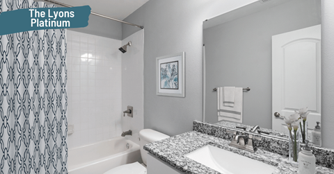 a bathroom with a sink and a tub and a mirror