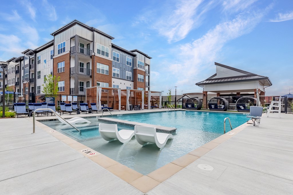 the preserve at ballantyne commons pool with apartment buildings