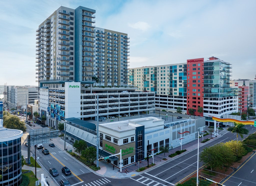 an aerial view of a city with tall buildings