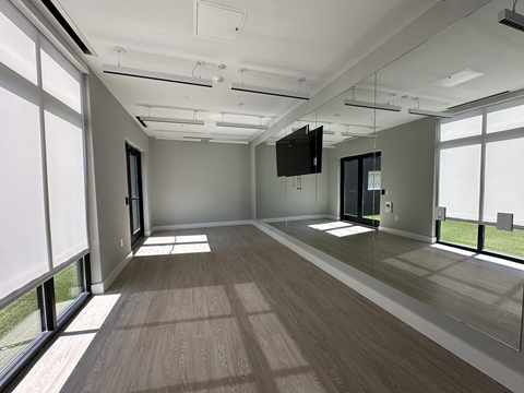 Dedicated yoga and stretching zone inside The Rail at Bound Brook’s fitness center—part of the community’s upscale amenities for residents seeking wellness and balance.