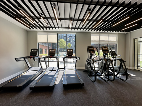 The Rail at Bound Brook’s resident gym featuring modern fitness equipment and wellness-focused amenities for a convenient and active apartment lifestyle.