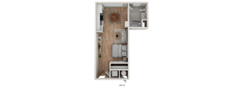 A small apartment with a bed, a couch, and a table.