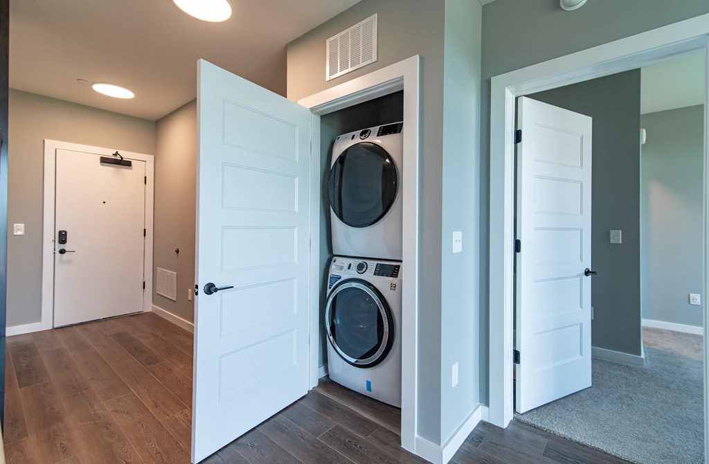 a small laundry room with a washer and dryer