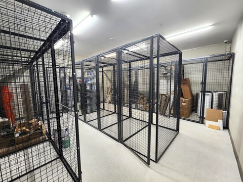 Resident storage lockers in a secure climate-controlled room at The Rail at Bound Brook apartments in New Jersey.