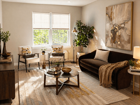 A living room with a brown couch, a coffee table, and a large painting on the wall.