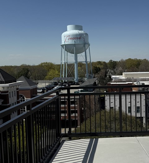 A water tower with the word "Cowley" written on it.