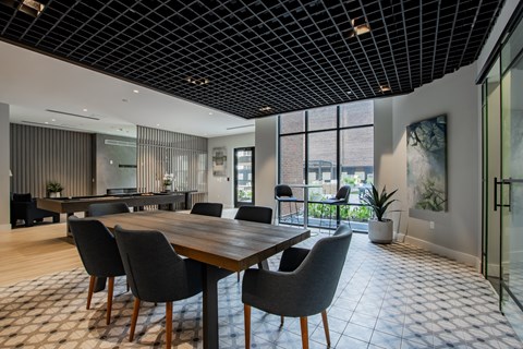 Bright dining and work nook in The Rail at Bound Brook resident lounge in Bound Brook, NJ.