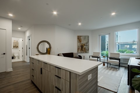 Modern kitchen island in a luxury apartment at The Rail at Bound Brook, NJ.