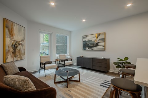 Sunlit living room in a Bound Brook NJ apartment with luxury finishes at The Rail at Bound Brook.