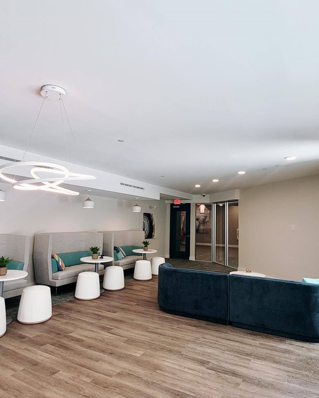 clubroom with couches and tables and chairs at Novi Rise, North Carolina