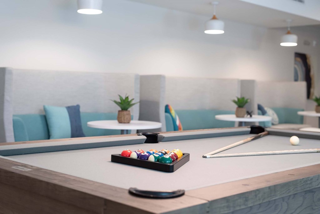 The pool table in the game room at Novi Rise
