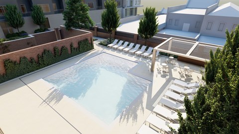 A pool surrounded by trees and chairs.