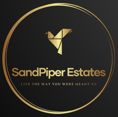 a logo for sandpiper estates live the way you were meant to