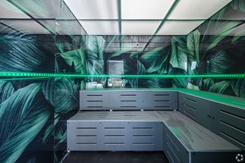 A Sauna With a Green Light Strip at Hue Soul Apartments, East Orange, NJ
