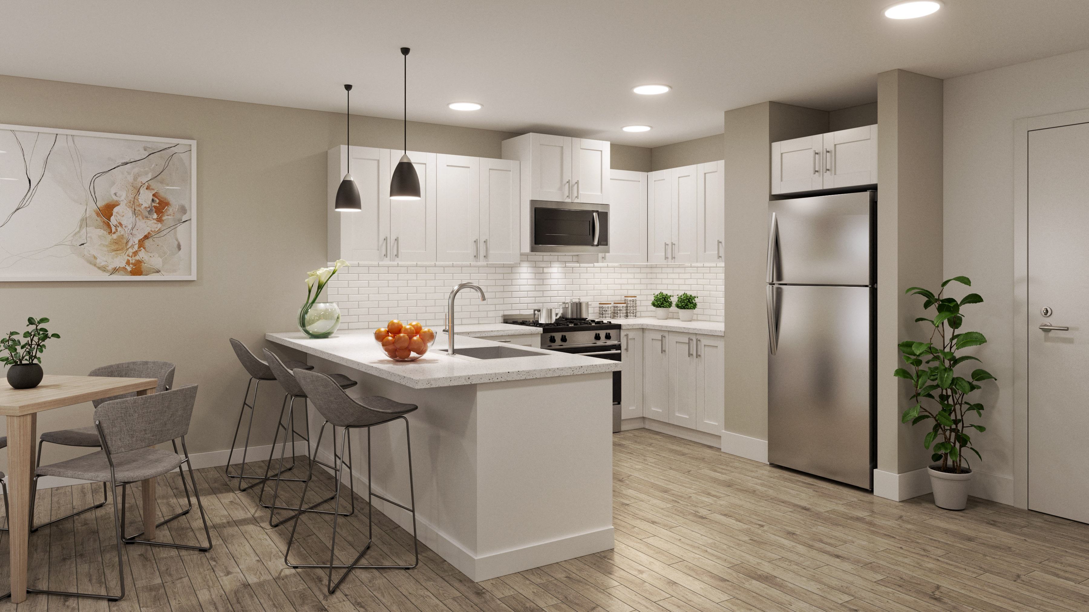 an open kitchen and dining area with a large island and stainless steel refrigerator