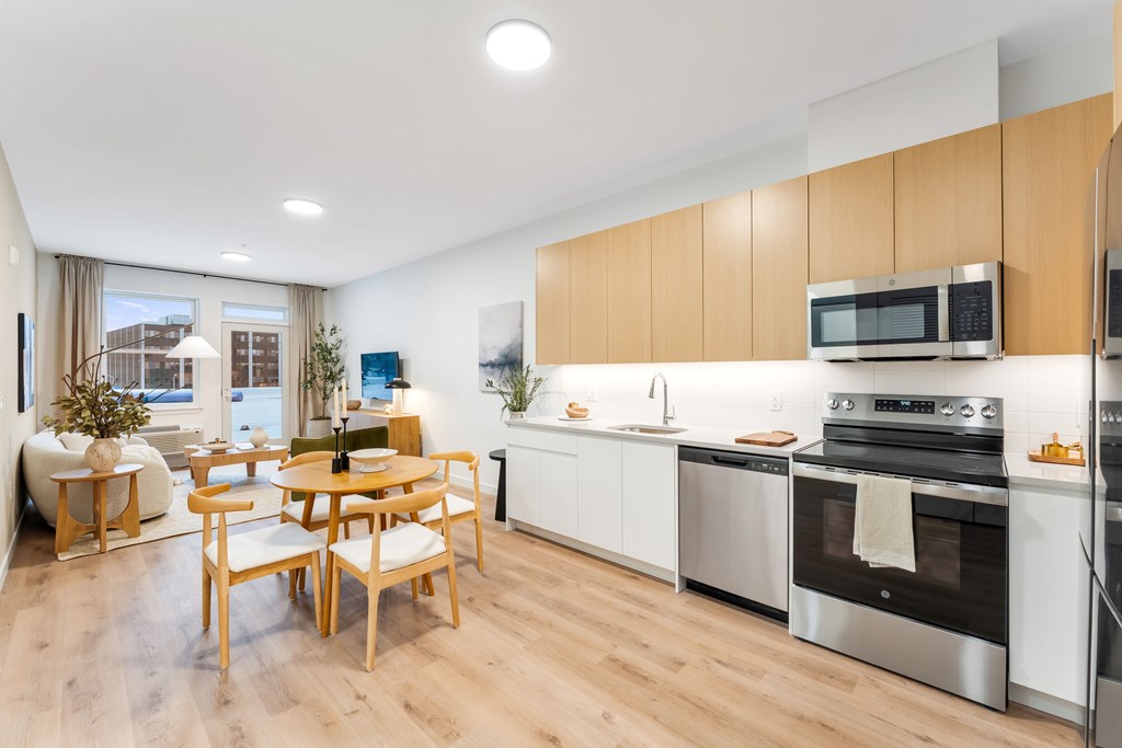 A Kitchen With Wooden Floors at Hue Soul Apartments, East Orange, New Jersey