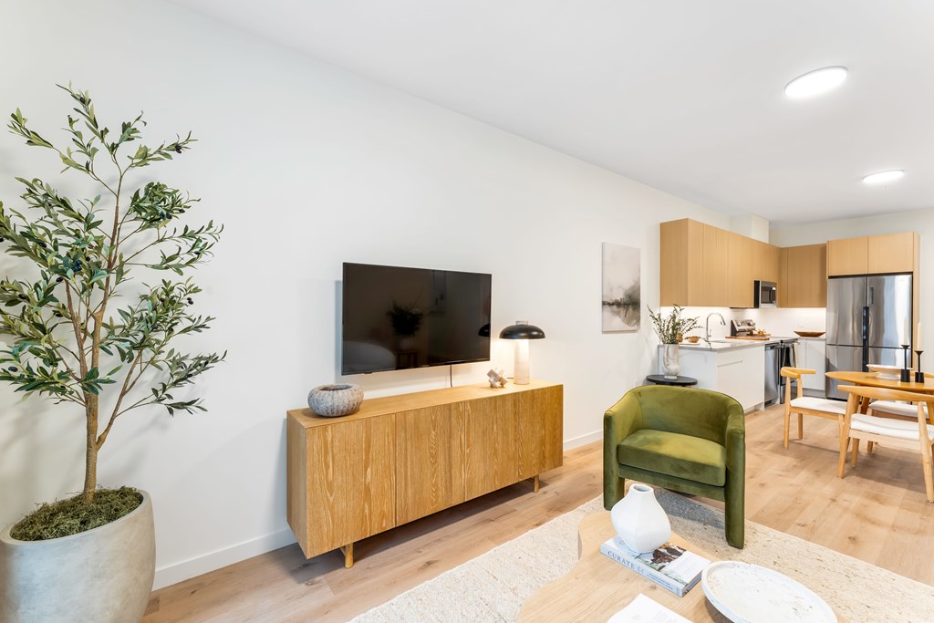 A Living Room With a TV at Hue Soul Apartments, New Jersey, 07018
