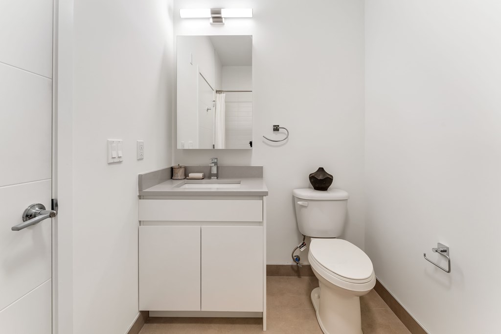A White Bathroom at Hue Soul Apartments, East Orange, New Jersey