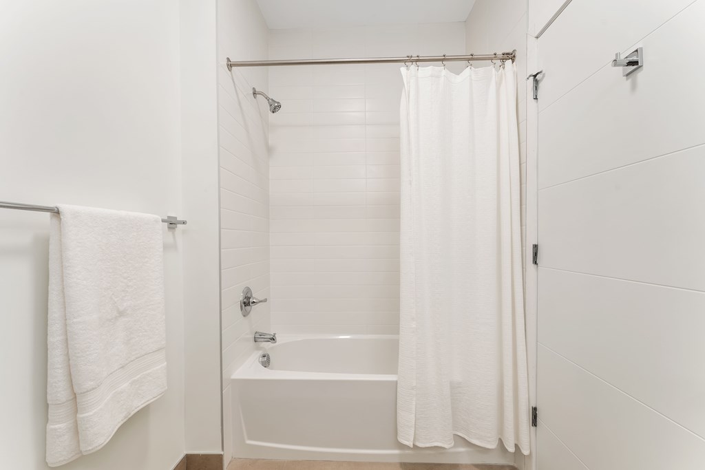 A Bathroom With a Bathtub at Hue Soul Apartments, East Orange, NJ, 07018