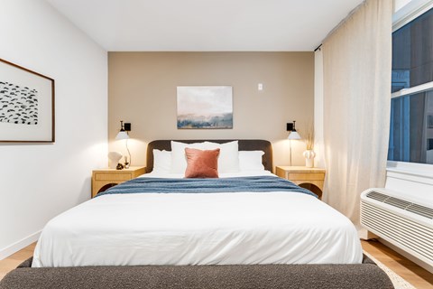 A Bedroom With a Large Bed at Hue Soul Apartments, East Orange, NJ, 07018