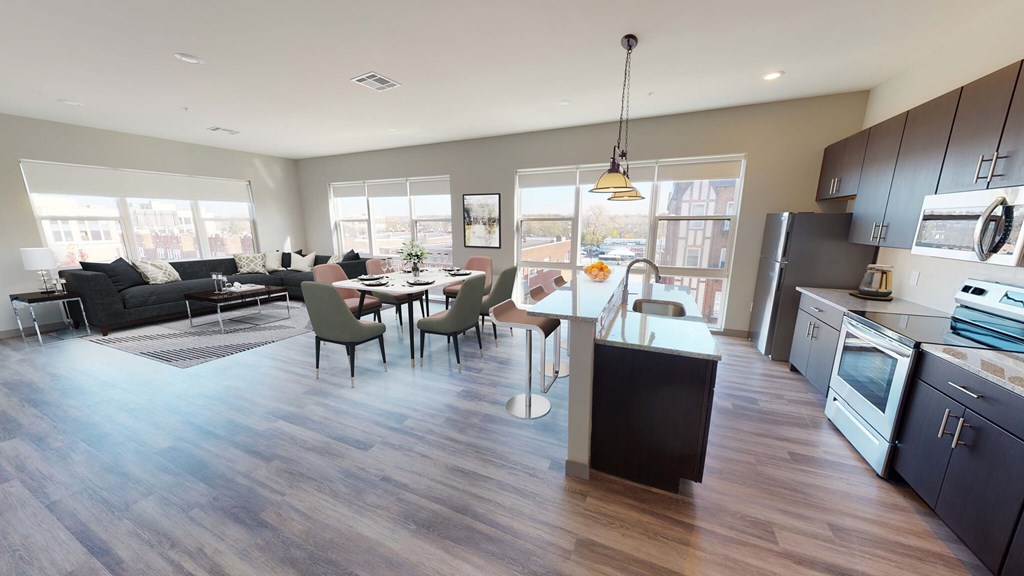 A modern kitchen with a dining table and chairs at Crossroads 389 Apartments, Hackensack 07601