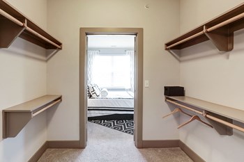 Extravagant Walk-in Closets with Custom Wood Shelving Property Image