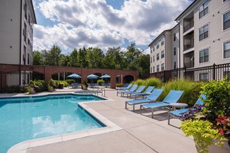 Pool Side Relaxing Area With Sundeck at The Cosmopolitan at Lorton Station, Virginia, 22079