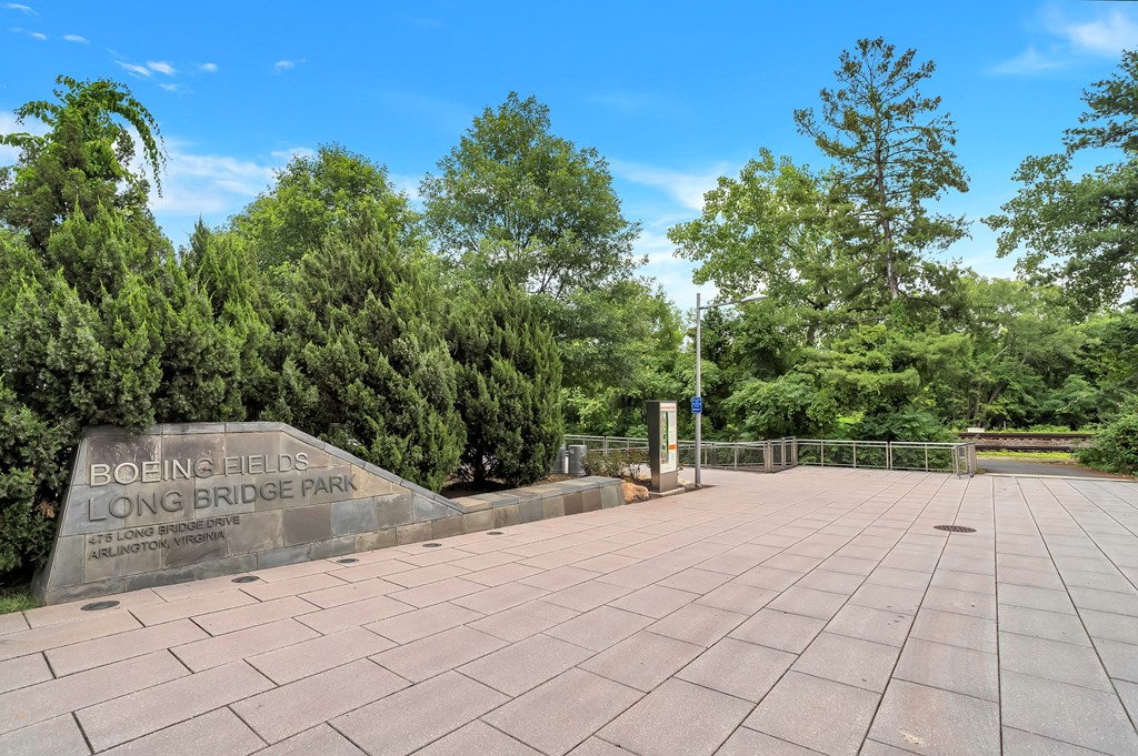 a park with trees and a stone sign that says bohemia