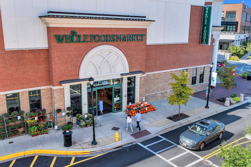 a workers market store on the corner of a city street