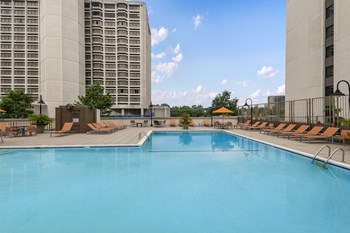 Sparkling Pool with Expansive Sundeck and Tanning Areas Luxury Apartment Rentals in Crystal City VA - Photo Gallery 4