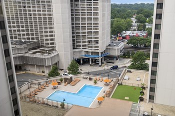 Sparkling Pool with Expansive Sundeck and Tanning Areas Luxury Apartment Rentals in Crystal City VA - Photo Gallery 6