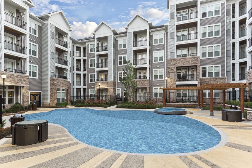 Resort-Style Swimming Pool With Expansive Tanning Areas Spacious Apartment Rentals in Woodbridge VA