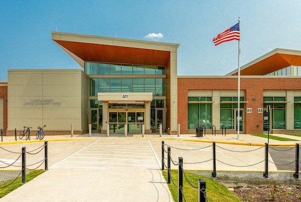 a building with an american flag in front of it