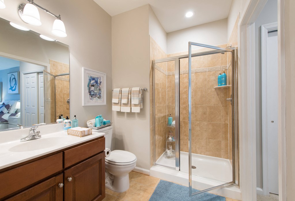 Spacious glass showers in select apartment homes at The Cosmopolitan at Lorton Station, Lorton, VA