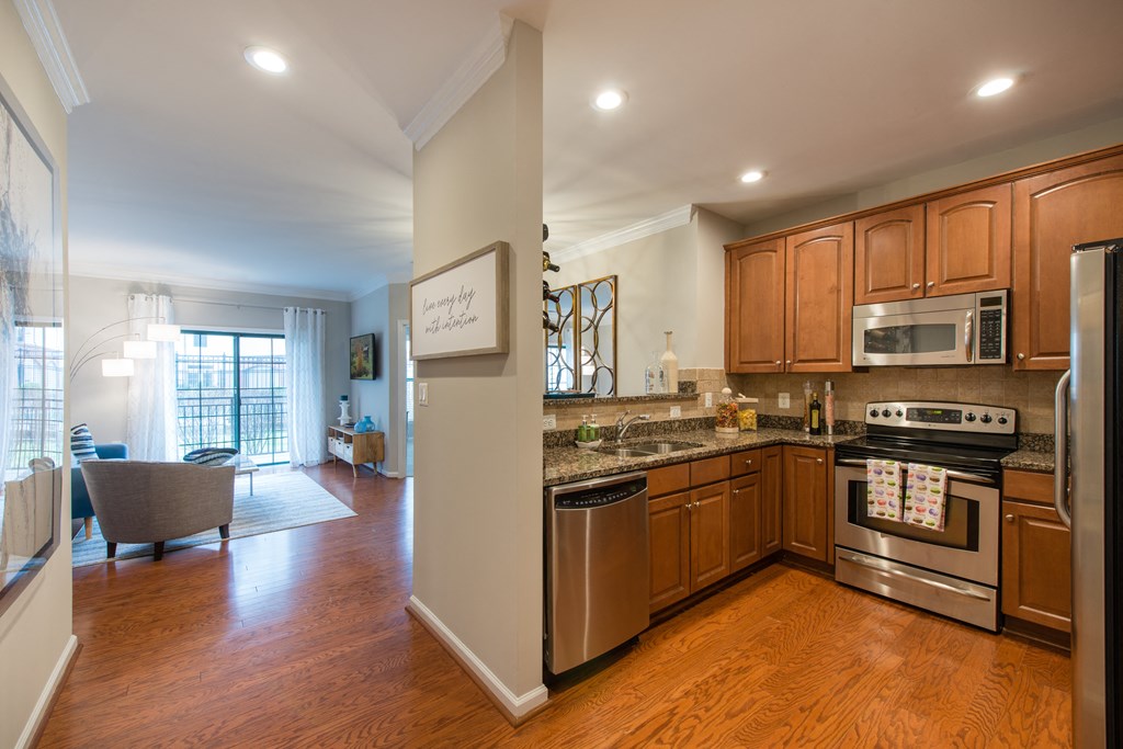 Hardwood style flooring in main living areas at The Cosmopolitan at Lorton Station, Lorton, 22079
