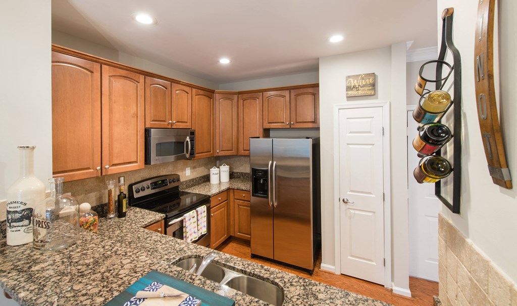 Plenty of storage space in designer kitchens at The Cosmopolitan at Lorton Station, Lorton, VA
