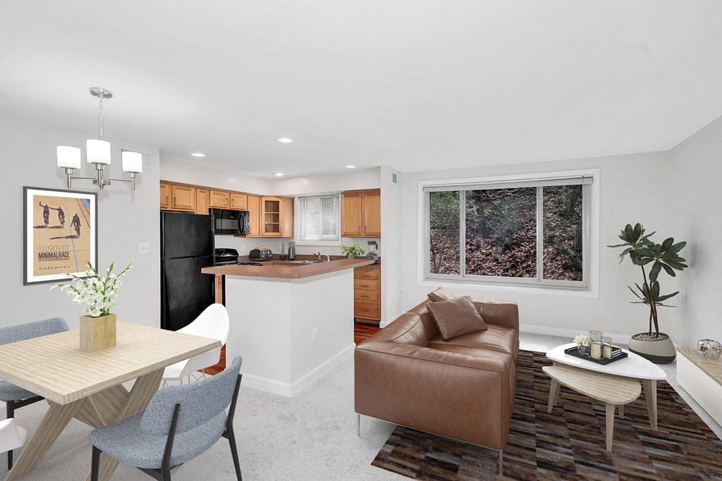 a living room and kitchen in a 555 waverly unit