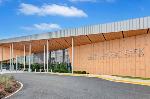 a large building with the long bridge park logo on it