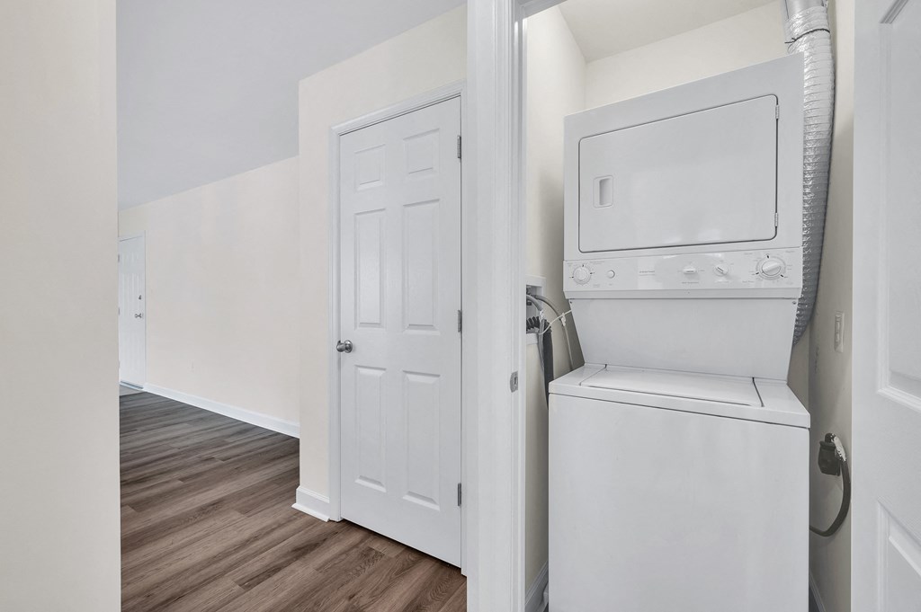 a room with a washer and dryer in it