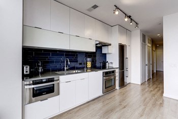 Custom Kitchen Cabinetry with Quartz Countertops Nice Apartment Rentals in Shaw DC - Photo Gallery 5
