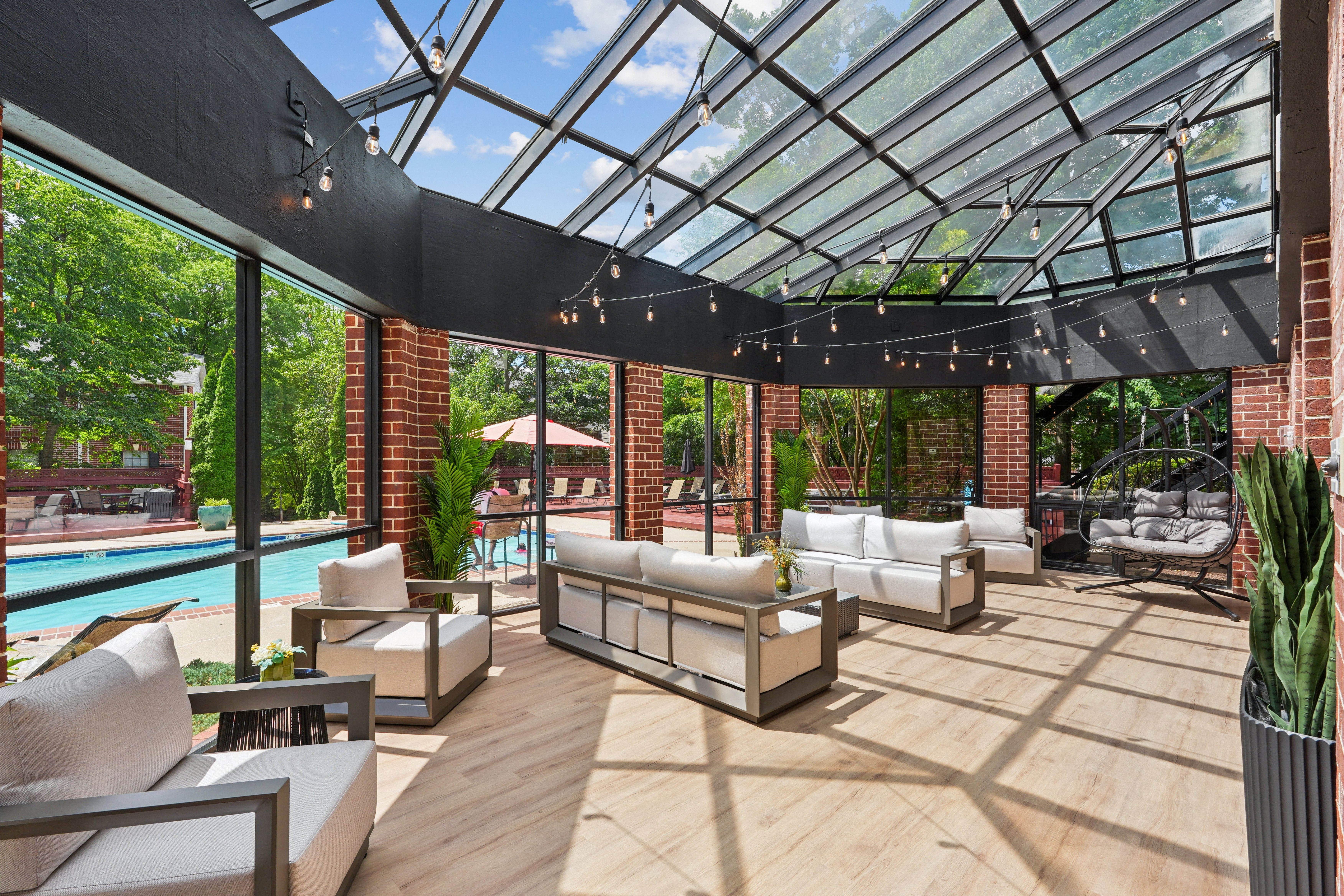 A sunny day at the outdoor patio with a pool.